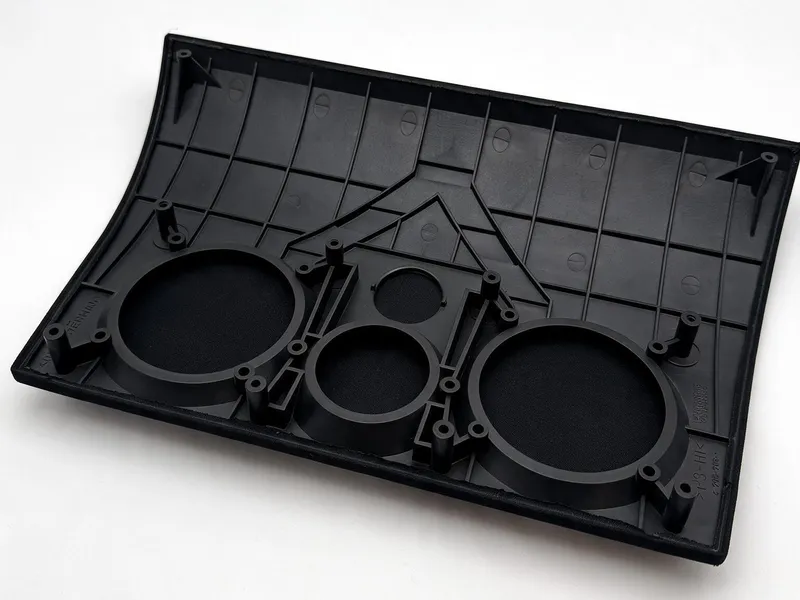 Fabric-covered speaker carrier